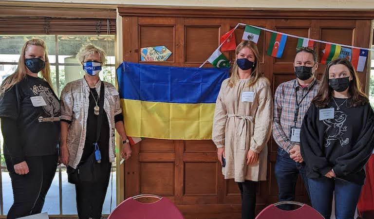 Faculty and staff at Ukraine table