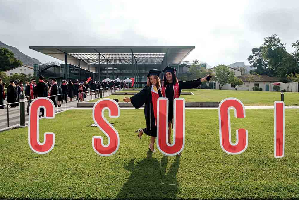 Students pose at Commencement Students pose at Commencement
