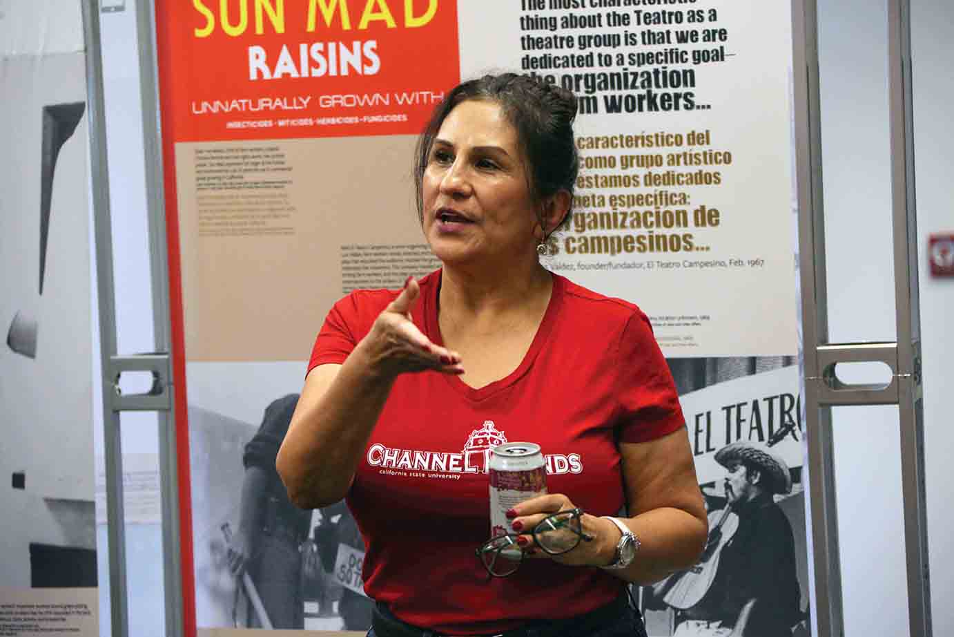Student Lisa Marie Ruiz speaks during a tour of the exhibit Student Lisa Marie Ruiz speaks during a tour of the exhibit