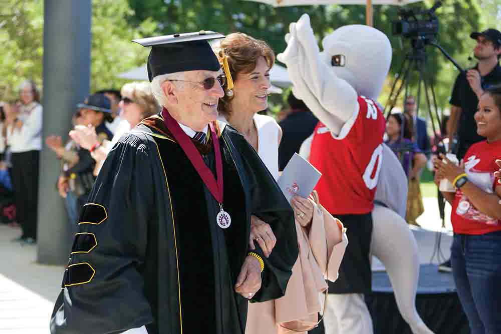 President Emeritus J. Handel Evans and Carol Evans attend President Yao’s Investiture ceremony. President Emeritus J. Handel Evans and Carol Evans attend President Yao’s Investiture ceremony.