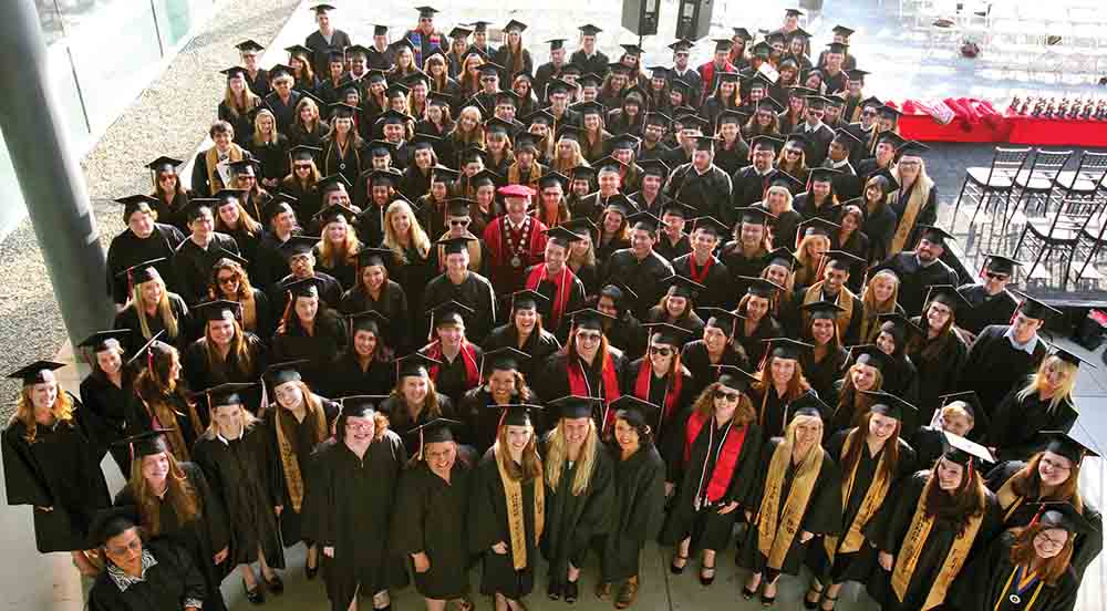 President Richard Rush is surrounded by students at Honors Convocation in 2011. President Richard Rush is surrounded by students at Honors Convocation in 2011.