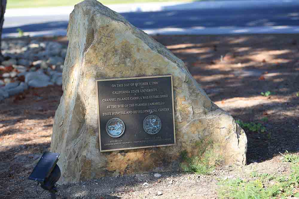 A large rock provided by the Broome family commemorates the Conveyance ceremony in October 1998 transferring the property from Camarillo State Hospital to the California State University. A large rock provided by the Broome family commemorates the Conveyance ceremony in October 1998 transferring the property from Camarillo State Hospital to the California State University.