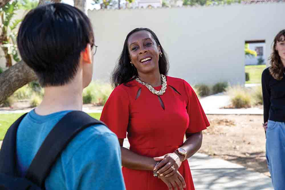 Vice President for Student Affairs Eboni Ford Turnbow, Ph.D., talks with a student. Vice President for Student Affairs Eboni Ford Turnbow, Ph.D., talks with a student.