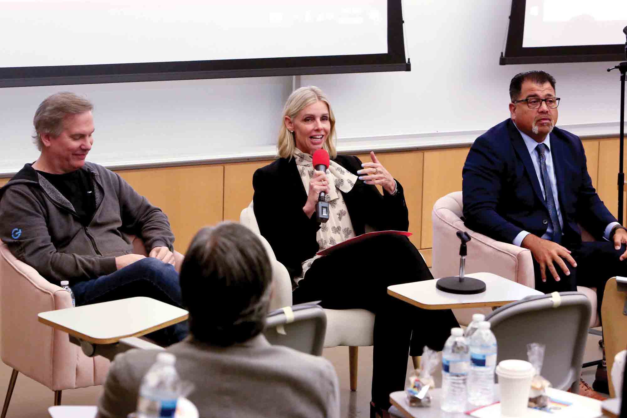 From left to right: a panel discussion at the AI Basecamp event.