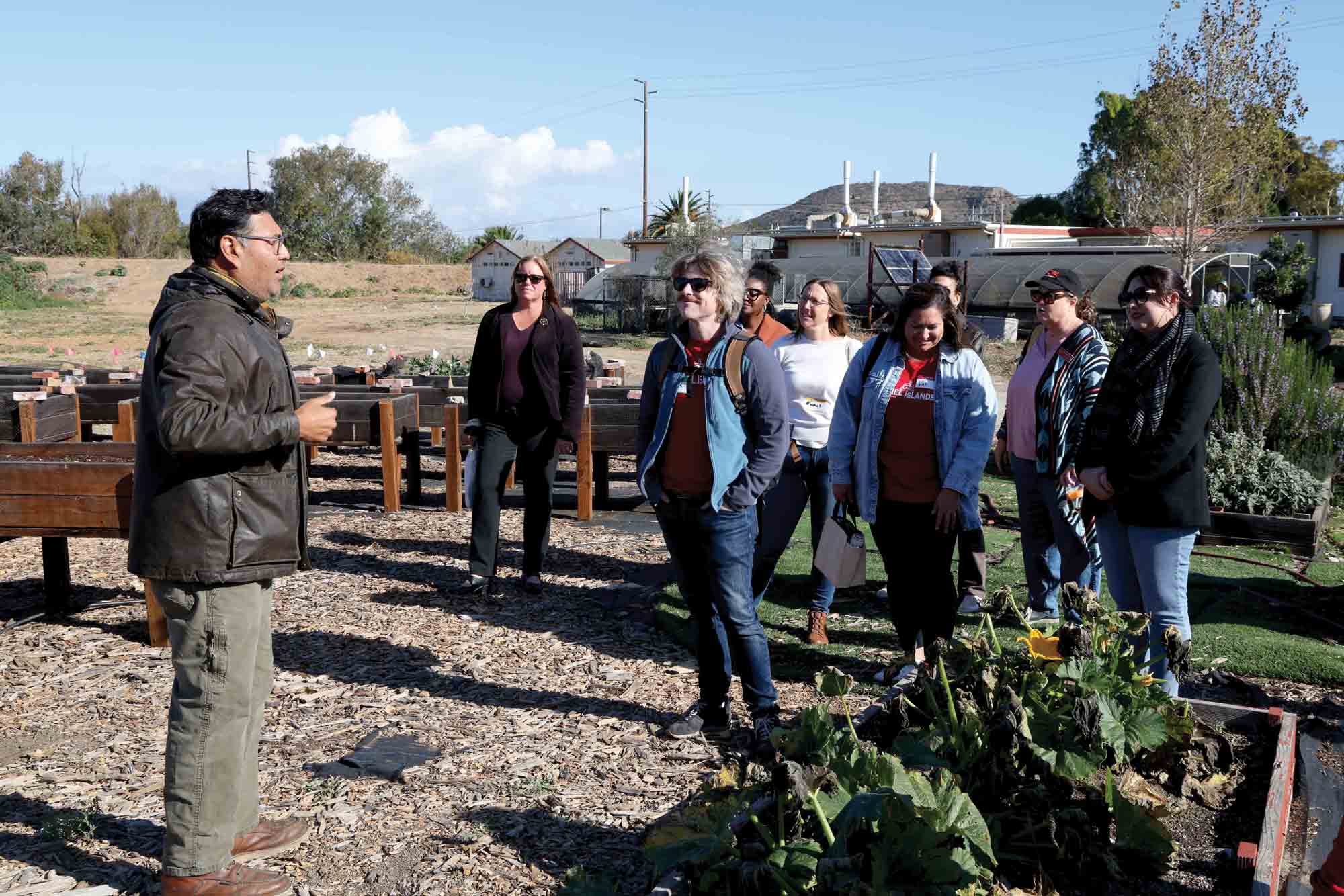 CSUCI Professor of Biology Ruben Alarcón speaks to a class about sustainable agriculture in Ventura County. 
