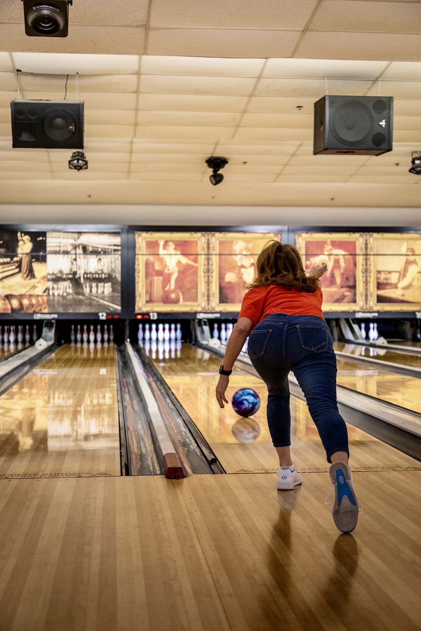 Photo of Crista Fisher in motion during the bowling event
